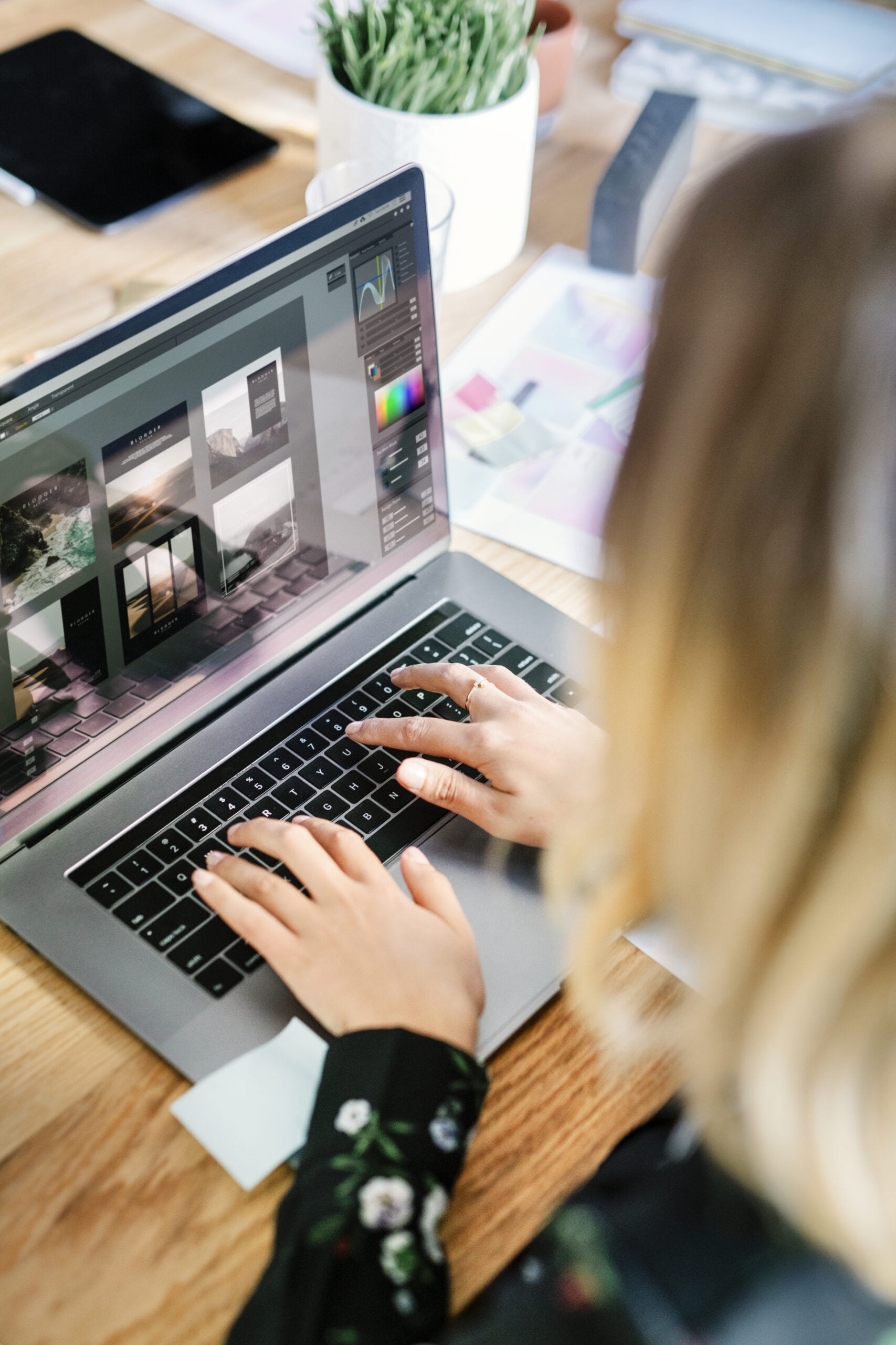 Female typing on a laptop, working from home
