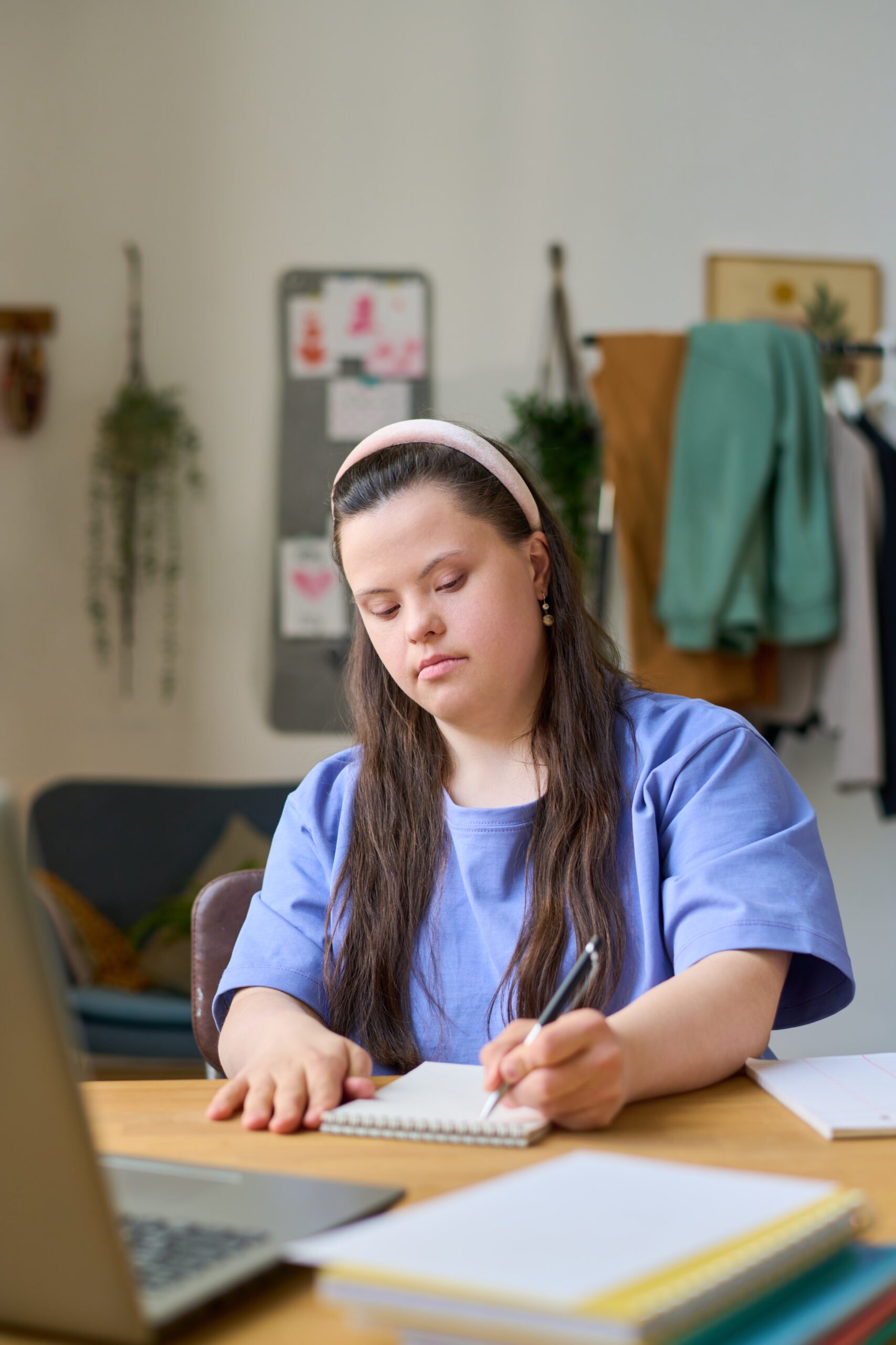 Female working at a desk with laptop