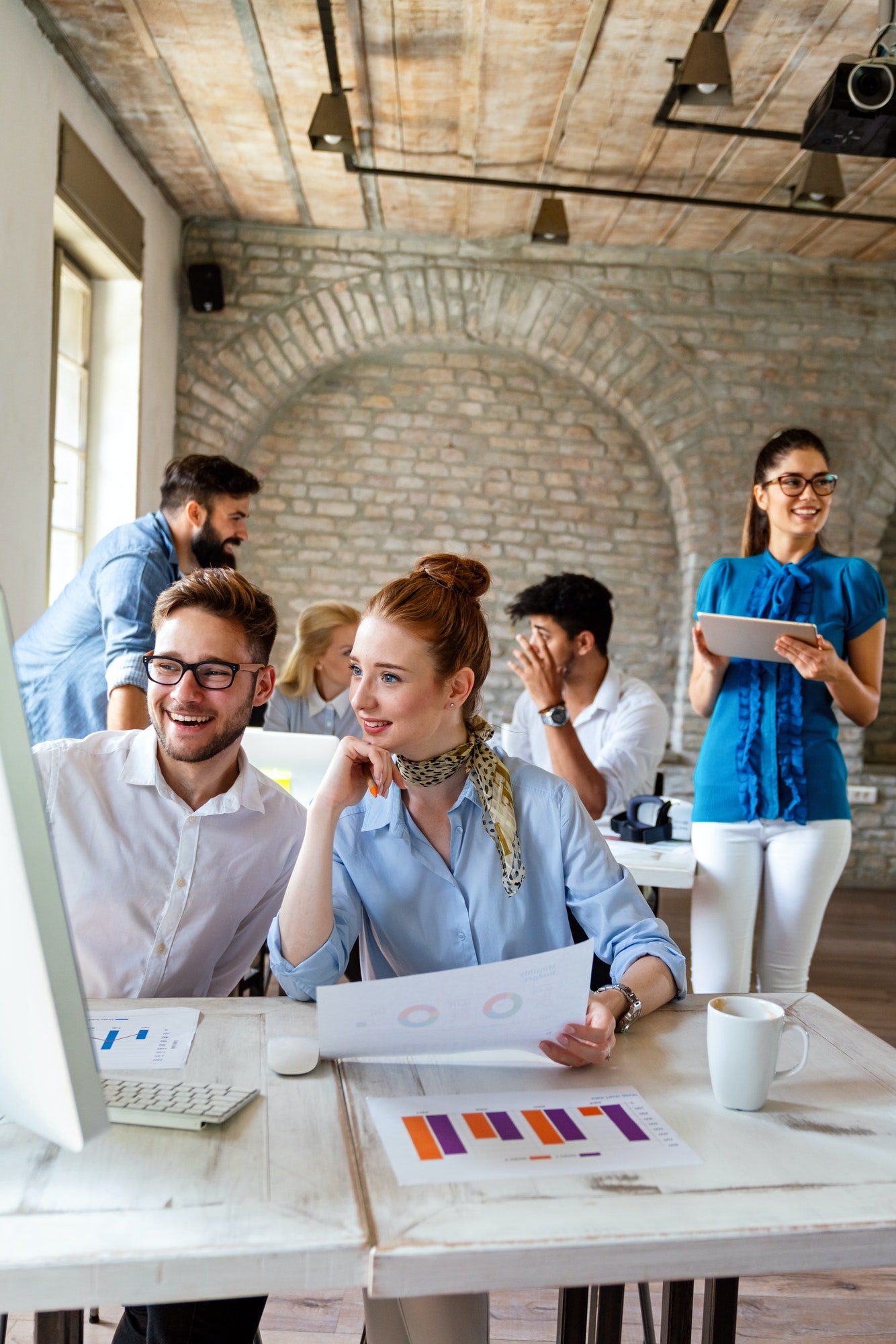Diverse business people in office brainstorming