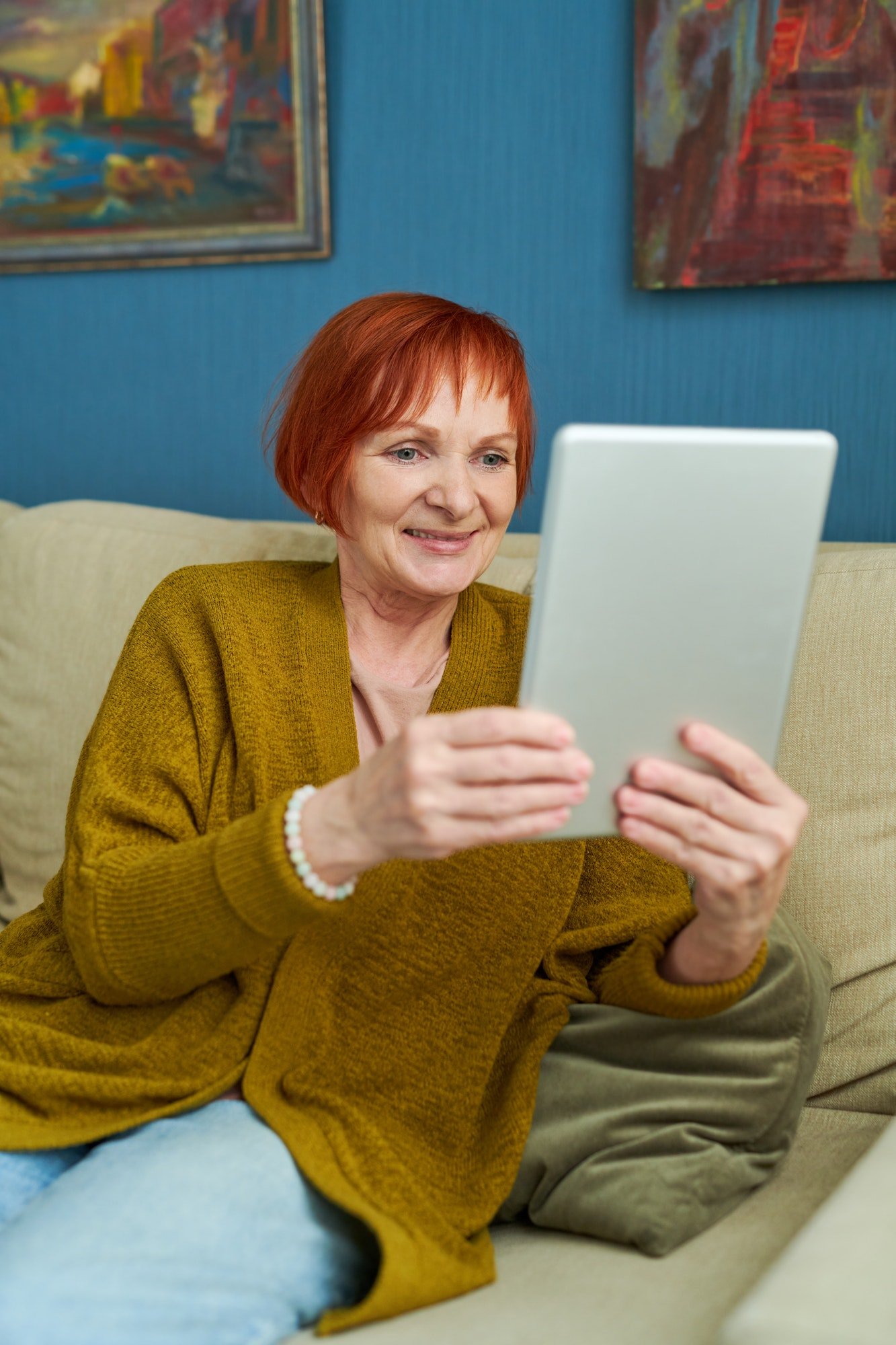 Middle-aged female on a video call on tablet