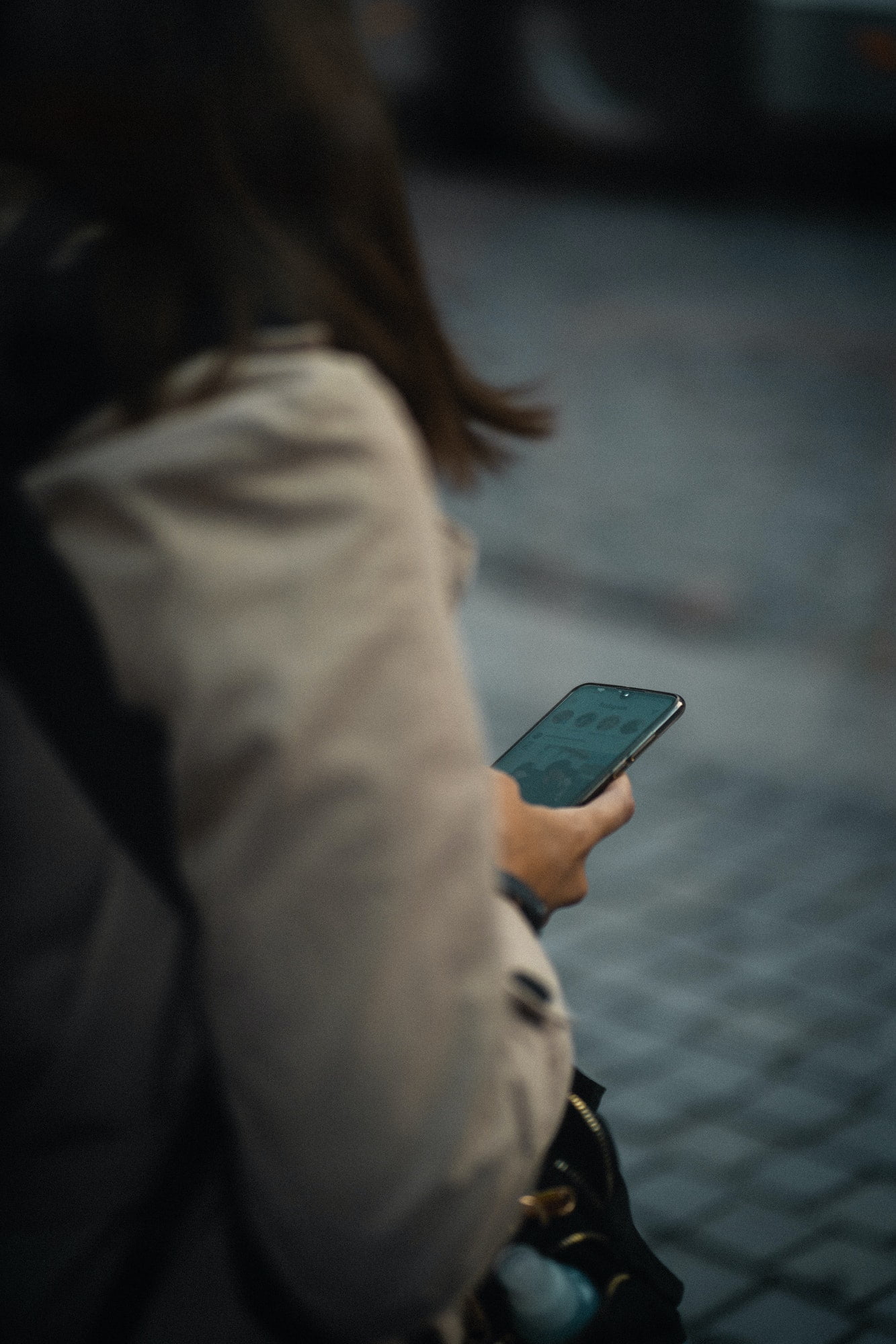 Unrecognisable woman scrolling through her Instagram feed