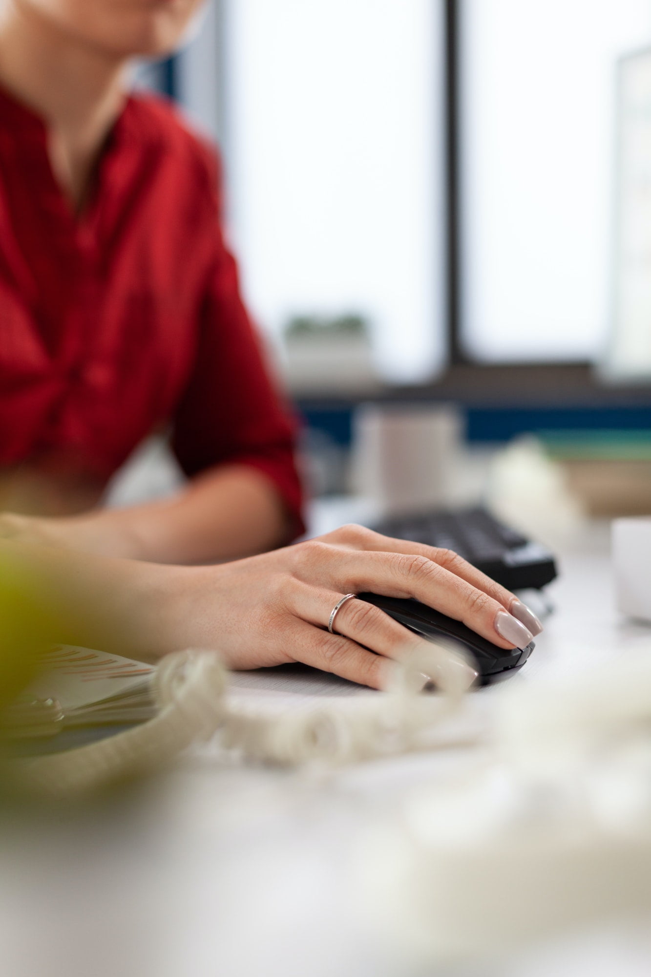 Close up view details of business woman hands in an office